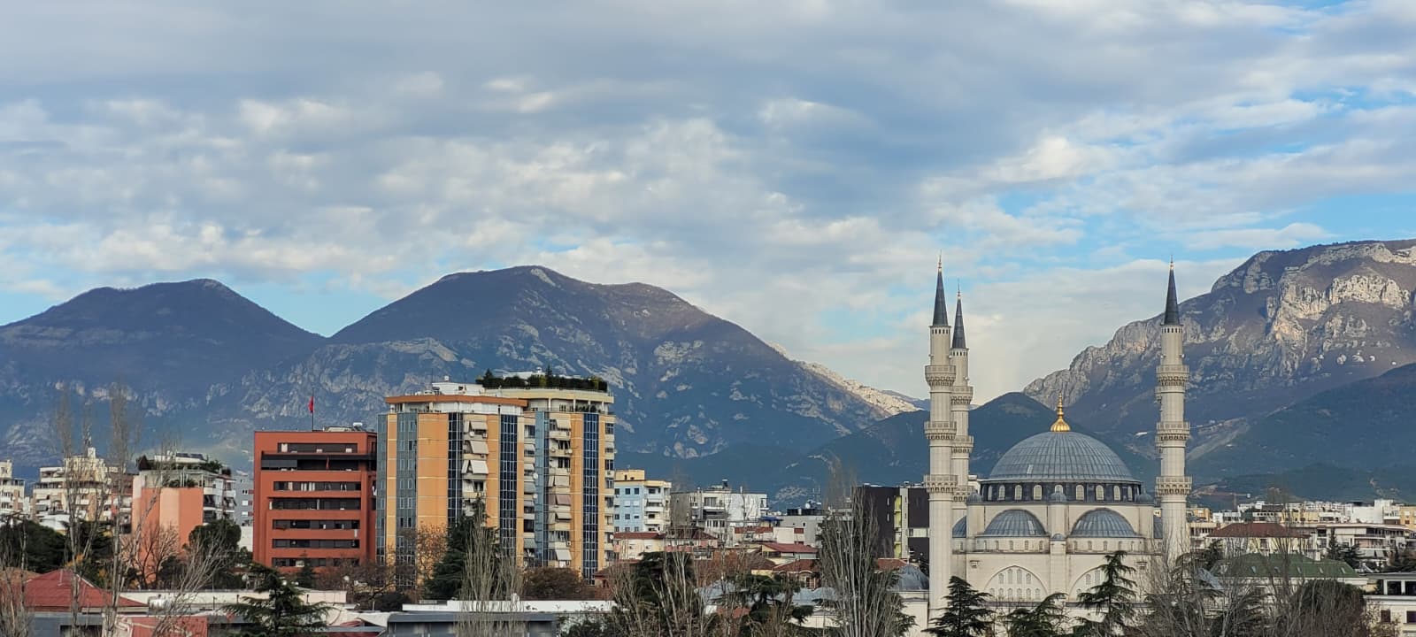 Tirana skyline with mountains behind